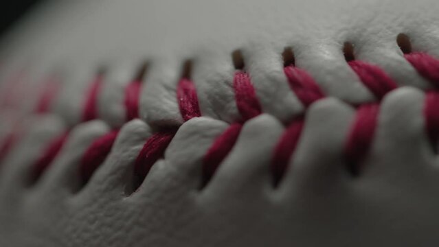 Dramatic, cinematic macro texture shots of a baseball