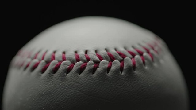 Dramatic, cinematic macro texture shots of a baseball