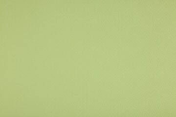 Stylish green wallpaper as background, closeup view