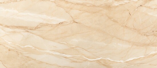 A close-up view of a beige marble textured surface, showcasing the intricate patterns and details...