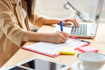 Business Financial, Accounting Banking Concept, businessman doing finances and calculate about cost to real estate investment and in other, tax system.