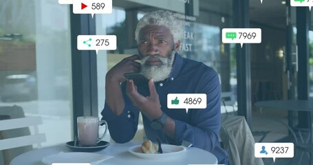 Animation of social media notifications over senior african american man using smartphone - Powered by Adobe