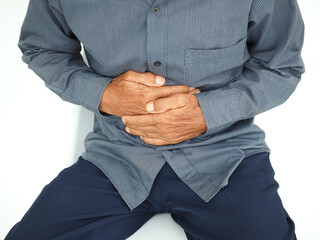 Man with stomach pain causes of abdominal pain include inflammatory bowel disease-IBD. stomach ulcer irritable bowel syndrome (IBS), ulcerative colitis and microvilli. Medical concept.