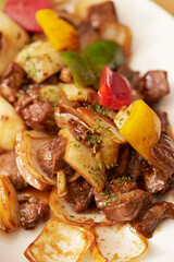 Chop steak with vegetables on a plate