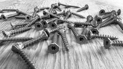 a construction screws Philips tool build hardware parts fastener screw closeup factory workshop...
