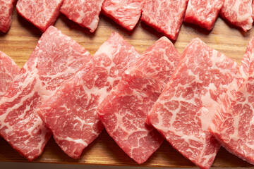 raw meat on a wooden board	