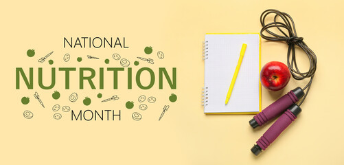 Notebook with pen, apple and skipping rope on color background