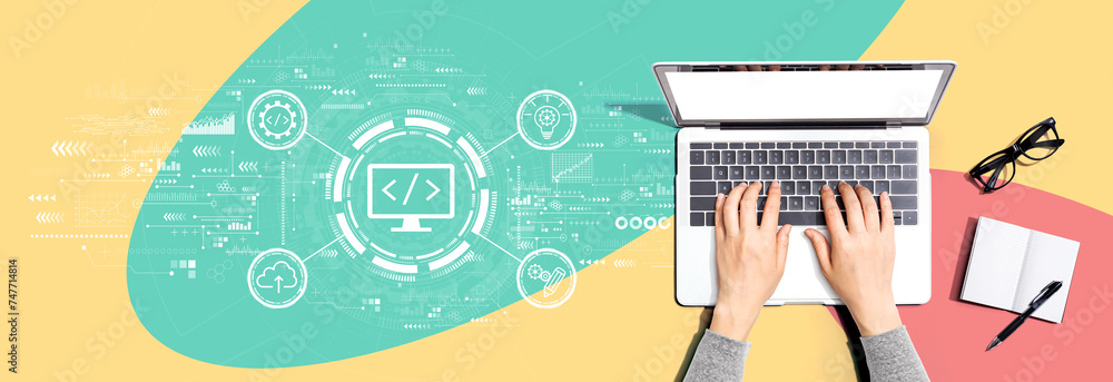 Aufkleber web development concept with person using a laptop computer