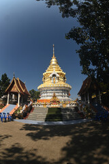 The large golden pagoda, which contains the sacred hair and relics of the Lord Buddha, is approximately 1,000 years old. That is revered and worshiped by Thai Buddhists at Wat Phra That Doi Saket.