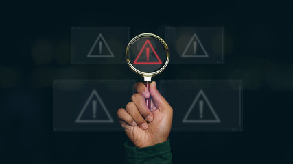 magnifying glass with triangle caution warning sign for notification error.
