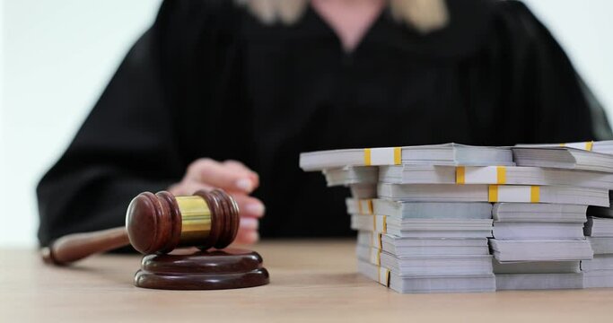 Judicial hammer for dollar money and financial crimes. Confiscation of property finances and assets