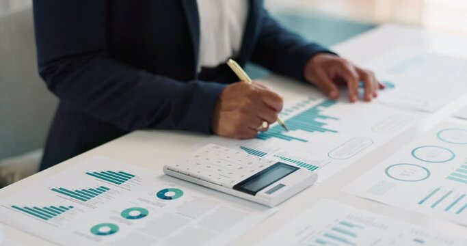 Business hands, calculator and financial data analytics, graphs or charts for revenue, profit or budget report. Accountant or bookkeeping person writing on documents, planning numbers and statistics