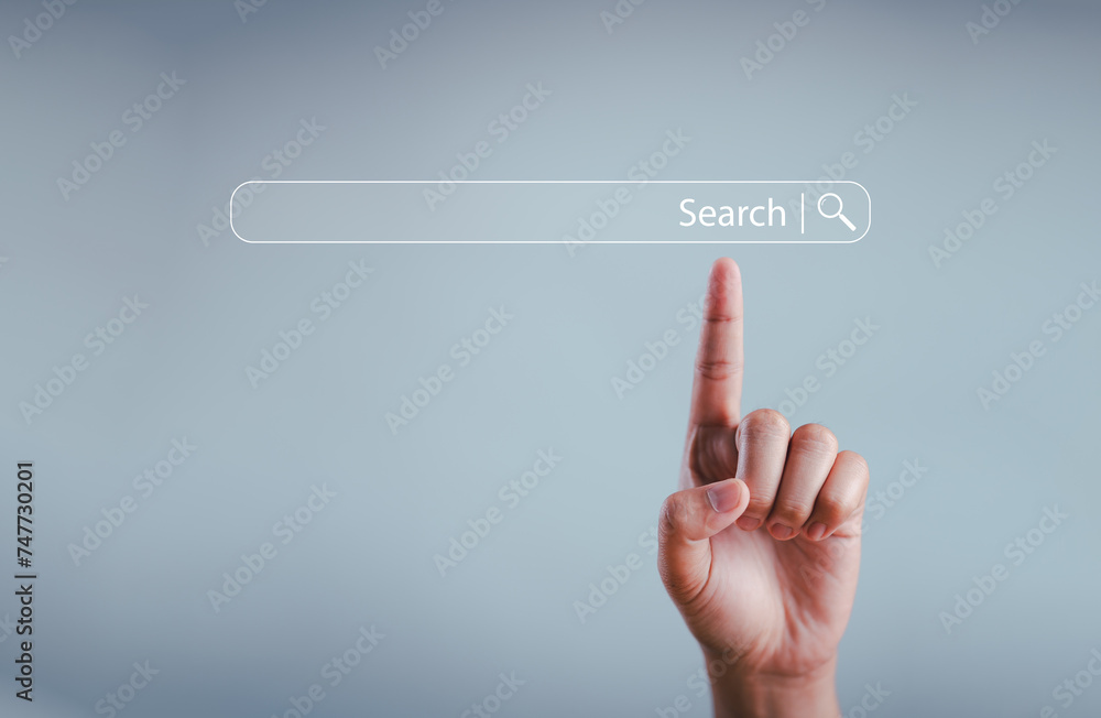 Leinwandbilder searching information data on internet networking concept. hand of man touching magnifying glass ico