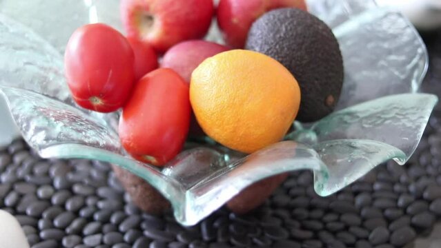 Close up shot of a bowl of fruit. Shot at 60FPS, slowed down to 24FPS. Shot on canon 80D with 50mm f1.8. STM.
