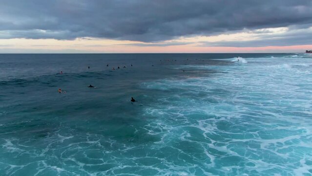 Drone flyover famous surf spot Banzai Pipeline, Ehukai Beach Park, Ohau