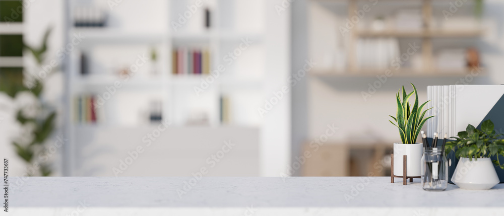 Poster a white desk with copy space for display product in a contemporary room with a large bookshelf.