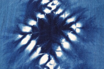 Tie Dye Texture. Pattern of blue tie batik dye on cotton cloth, Dyed indigo fabric background and...