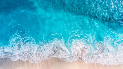  Aerial view of turquoise sea waves meeting a sandy beach - perfect for travel, summer vacation, and tropical destinations concepts © fotogurmespb