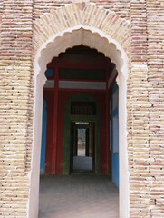 Bricks arch of an ancient house historic building brick arc architecture old fashioned house entrance front door view image photo 