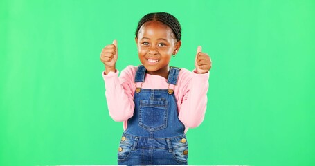 Child, thumbs up and portrait by green screen with smile for like, thanks or vote for agreement....