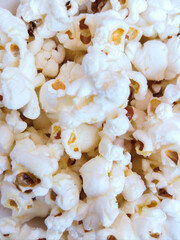 Popcorn crispy and salted pop-corns mais souffle snack food closeup palomitas pipoca, closeup view...