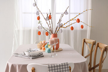 Festive Easter table setting in light dining room