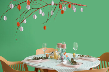 Beautiful table setting for Easter celebration in dining room