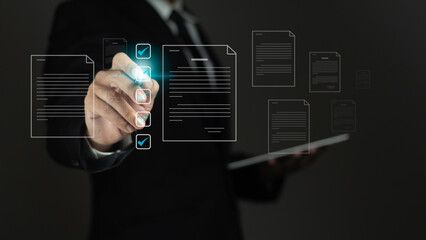 Businessman using tablet and check analysis data on visual screen.