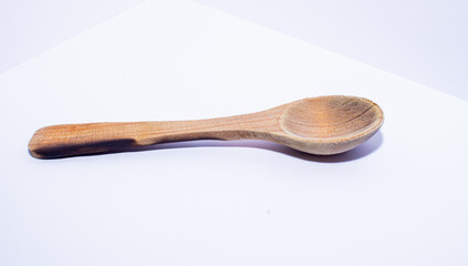 wooden spoon on a white