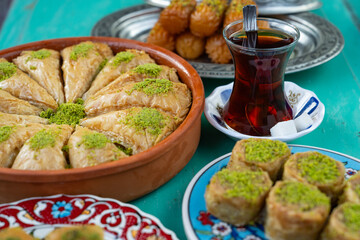 Turkish Tea (Turk Cayi) in the Traditional Turkish Sherbet Desserts (Baklava, Tulumba, Havuç Dilim) Photo, Uskudar Istanbul, Turkiye (Turkey)
