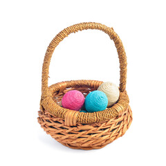 Wicker basket isolated on white background. Easter eggs.