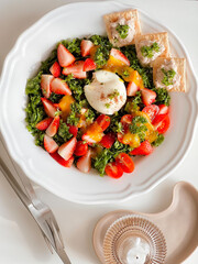 Healthy strawberry kale salad with boiled egg and tuna crackers for breakfast. Morning time. Fresh meal. Delicious food. Homemade food. Cooking recipes. Brunch. Healthy recipes. Vegetable. Clean food.