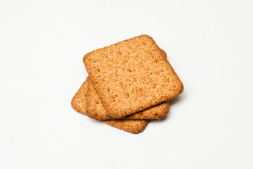 whole wheat flour crackers isolated on a white background