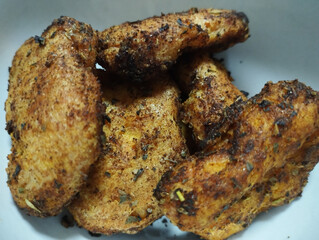 golden air-fried chicken nuggets with herbs