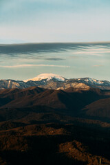 Fototapeta na wymiar Mount Akhun tower offers stunning views of mountains and autumn landscape.