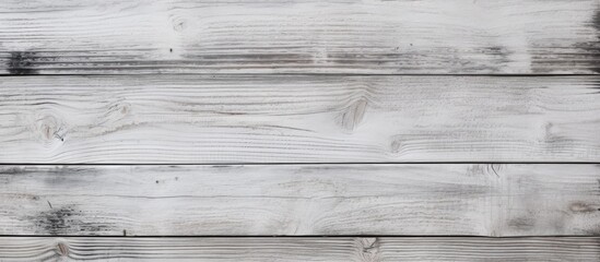 A grayscale image showcasing the detailed texture of horizontal black and white wood planks.
