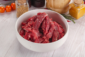 Raw beef meat - sliced strips