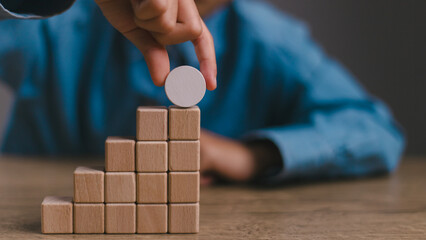 Blank wooden cubes on the table with copy space, empty wooden cubes for input wording, and an infographic icon...