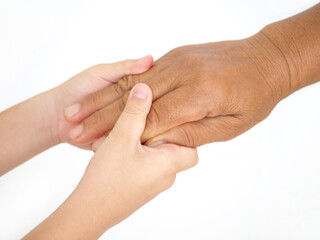 Grandmother and child little boy holding hand together with love.