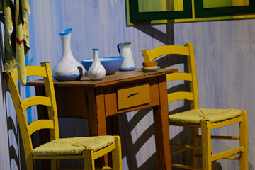tables and chairs that's like a painting