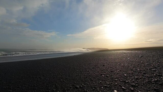 Reynisfjara black sand beach under severe high wind storm in Iceland