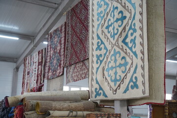Traditional national Kazakh ornament on a felt carpet.