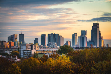 Warsaw, Poland - panorama of a city skyline at sunset. Cityscape view of Warsaw. Skyscrapers in Warsaw