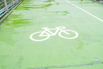 Road sign bicycle path on the green bridge in tokyo,Bike path.