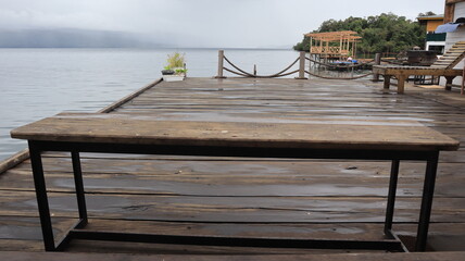 wooden pier on Lake Matano, Sorowako, South Sulawesi. Indonesia