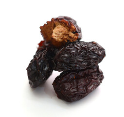 Raisins on a white background - stock photo
