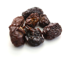 Raisins on a white background - stock photo
