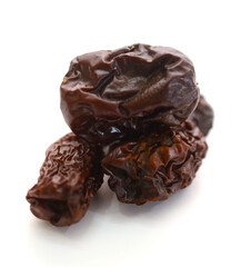 Raisins on a white background - stock photo
