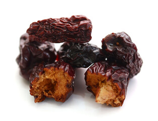 Raisins on a white background - stock photo
