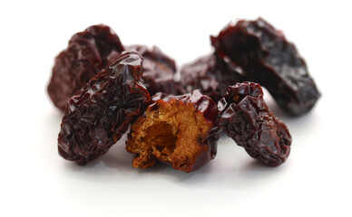 Raisins on a white background - stock photo
